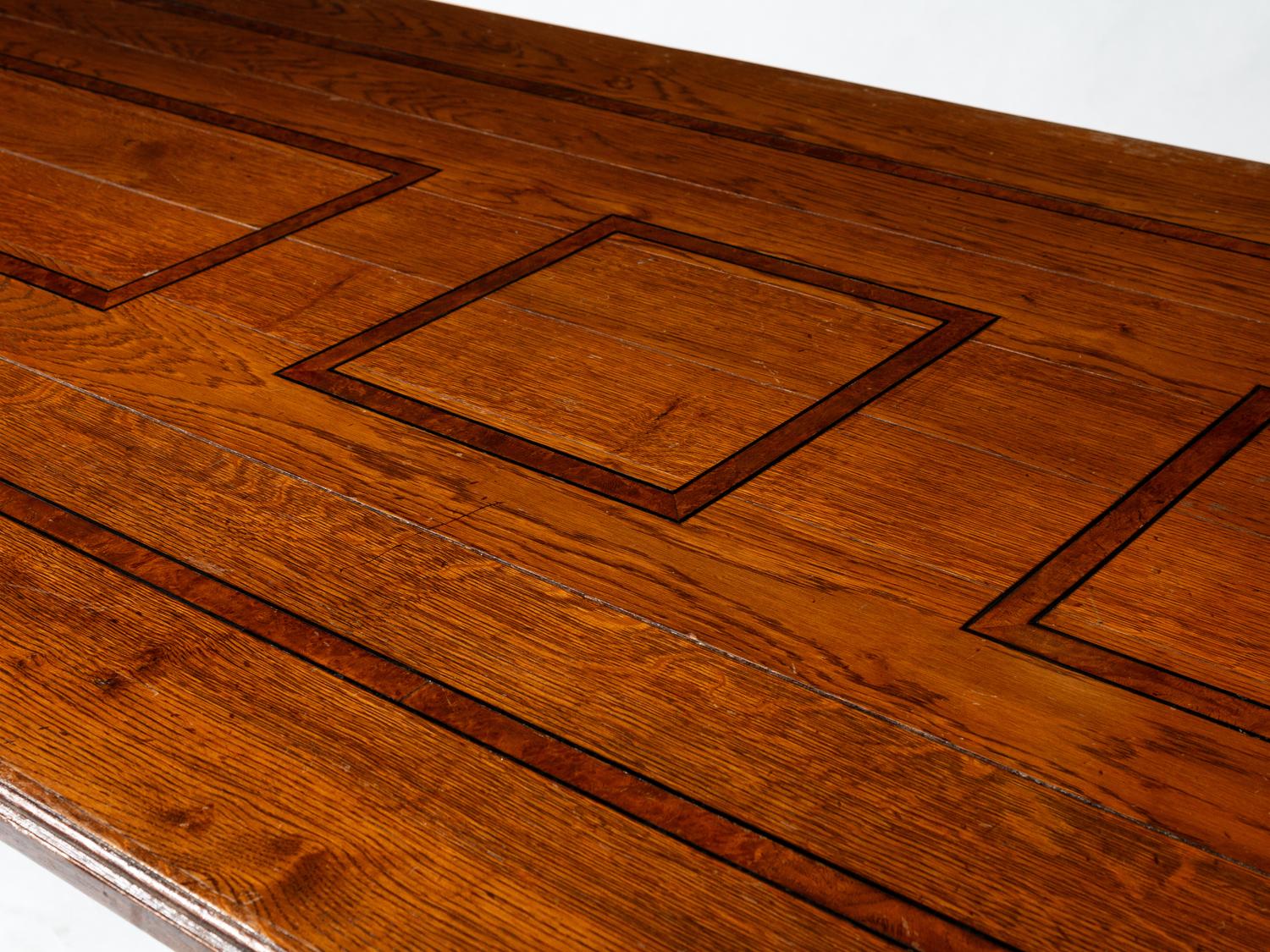 A Large Italian Renaissance Style Iron Mounted Oak and Burl Walnut Library Table