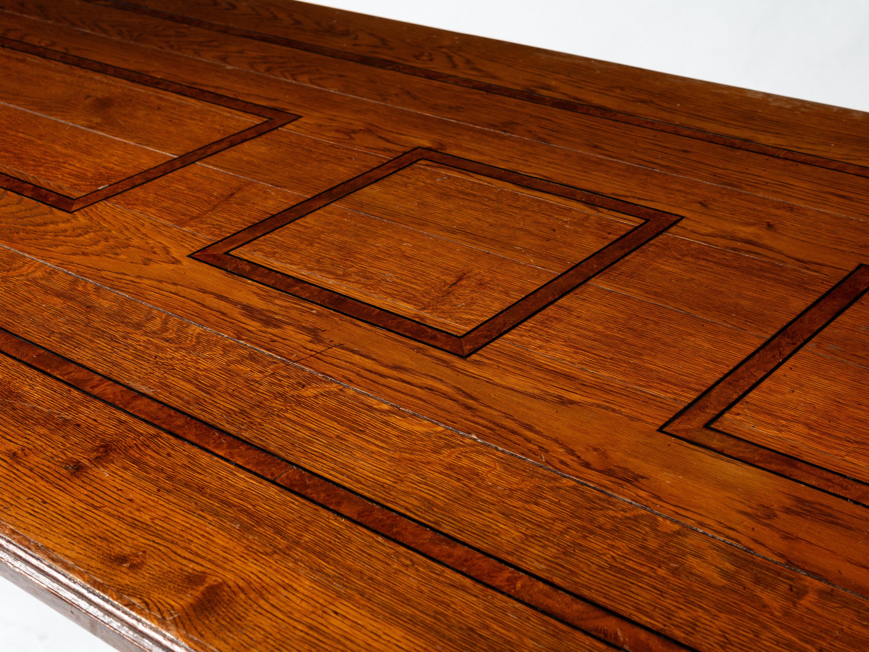 A Large Italian Renaissance Style Iron Mounted Oak and Burl Walnut Library Table
