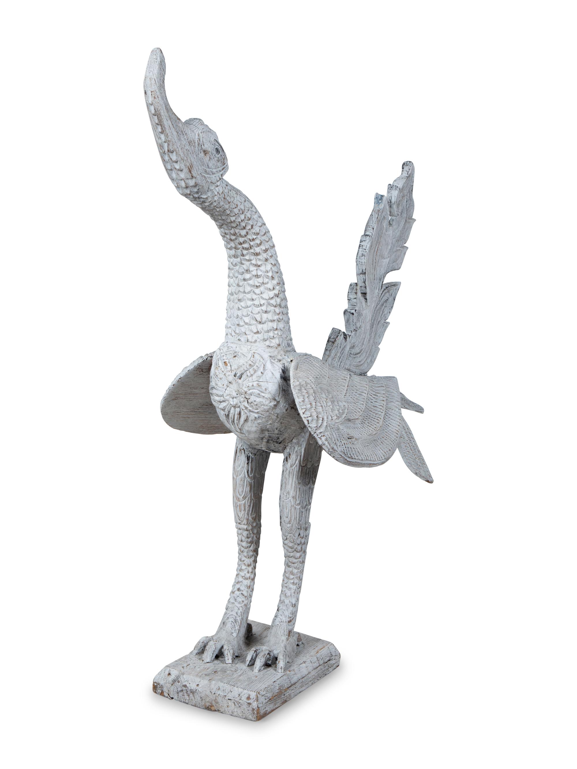 An Indonesian Carved and White-Painted Garuda — 20TH CENTURY