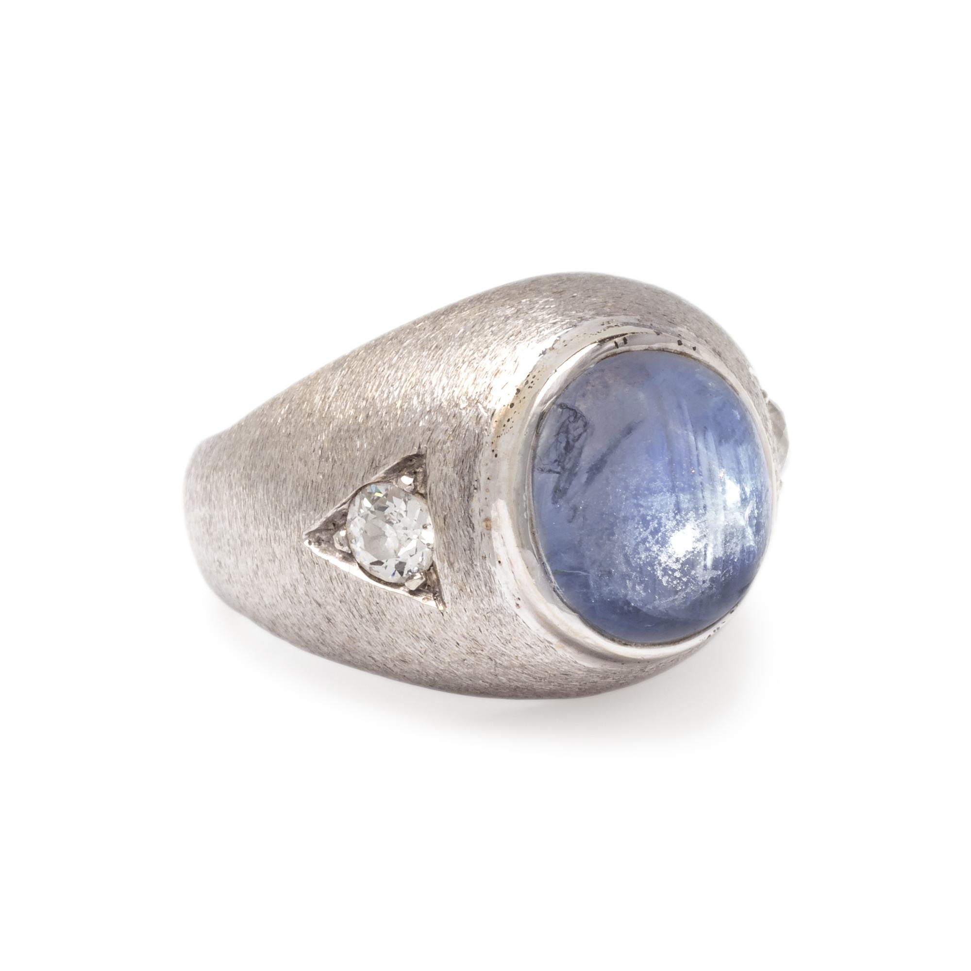 WHITE GOLD, STAR SAPPHIRE AND DIAMOND RING