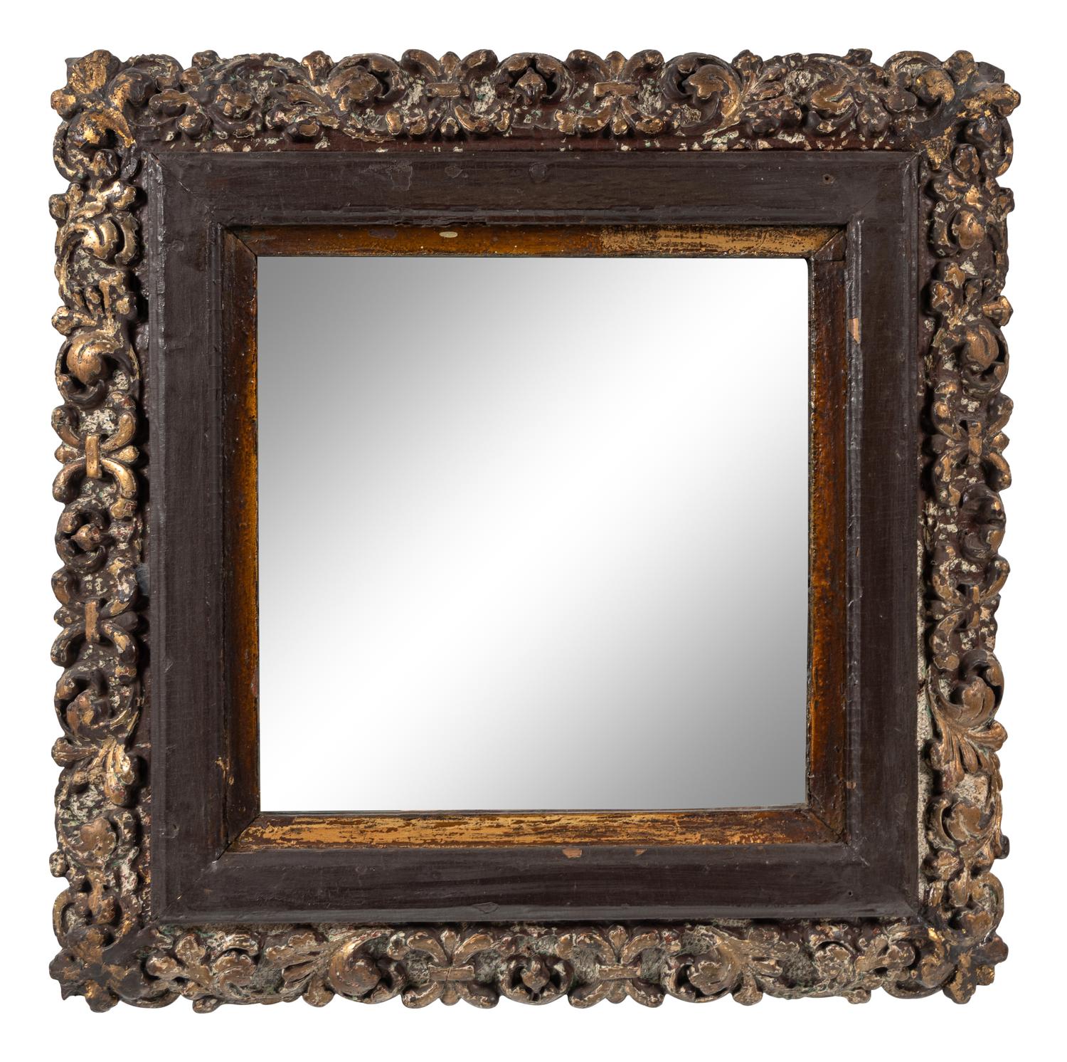 A Continental Polychrome and Parcel-Gilt Carved Mirror