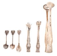 An Assembled Group of Silver Tongs and Condiment Spoons, Various Makers, including three salt spoons, two sugar cube tongs, and an ice