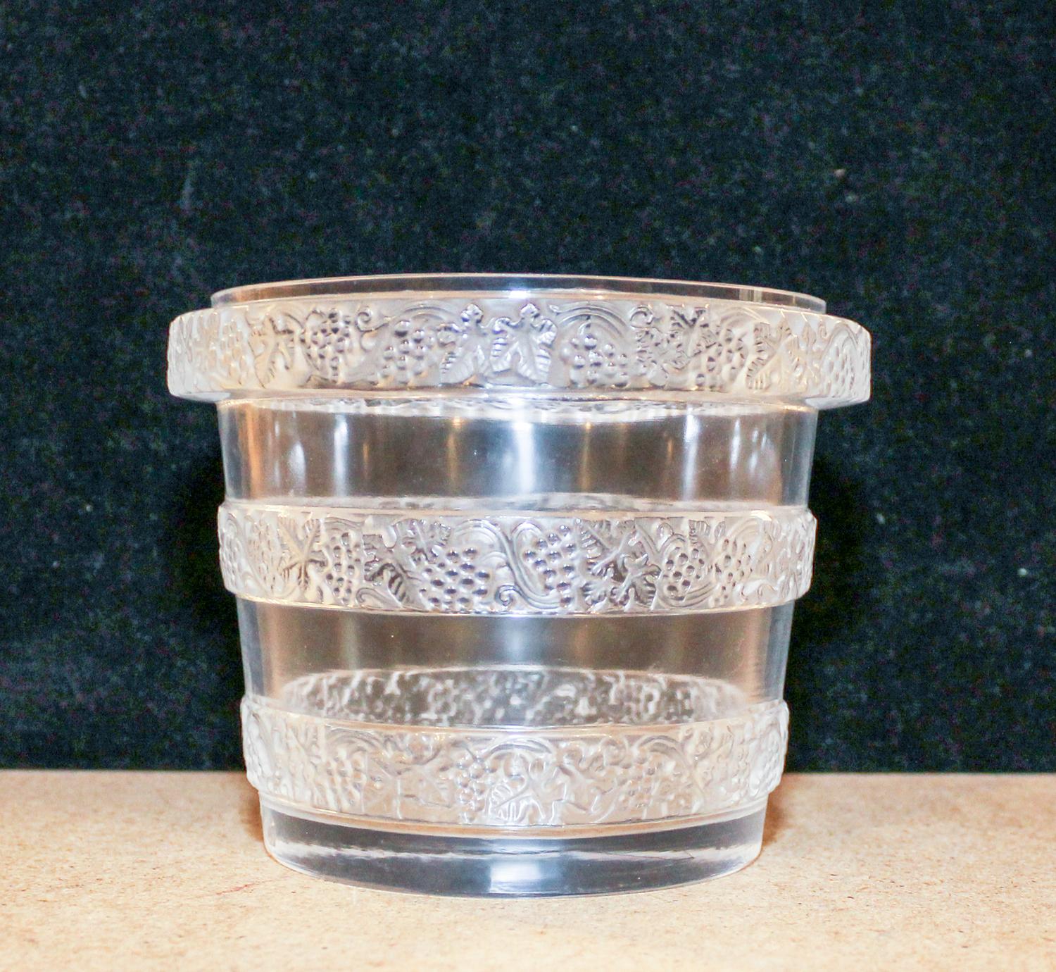 A Lalique Molded and Frosted Glass Vase Height 4 1/4 inches.