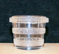A Lalique Molded and Frosted Glass Vase Height 4 1/4 inches.