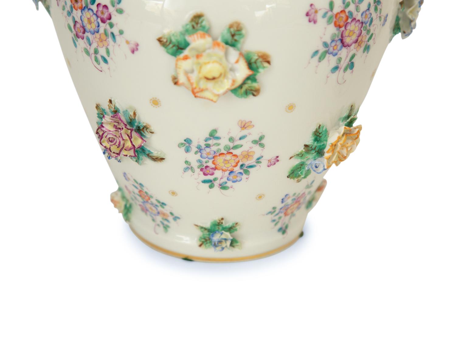 A Pair of Meissen Porcelain Covered Jars with Figural Finials