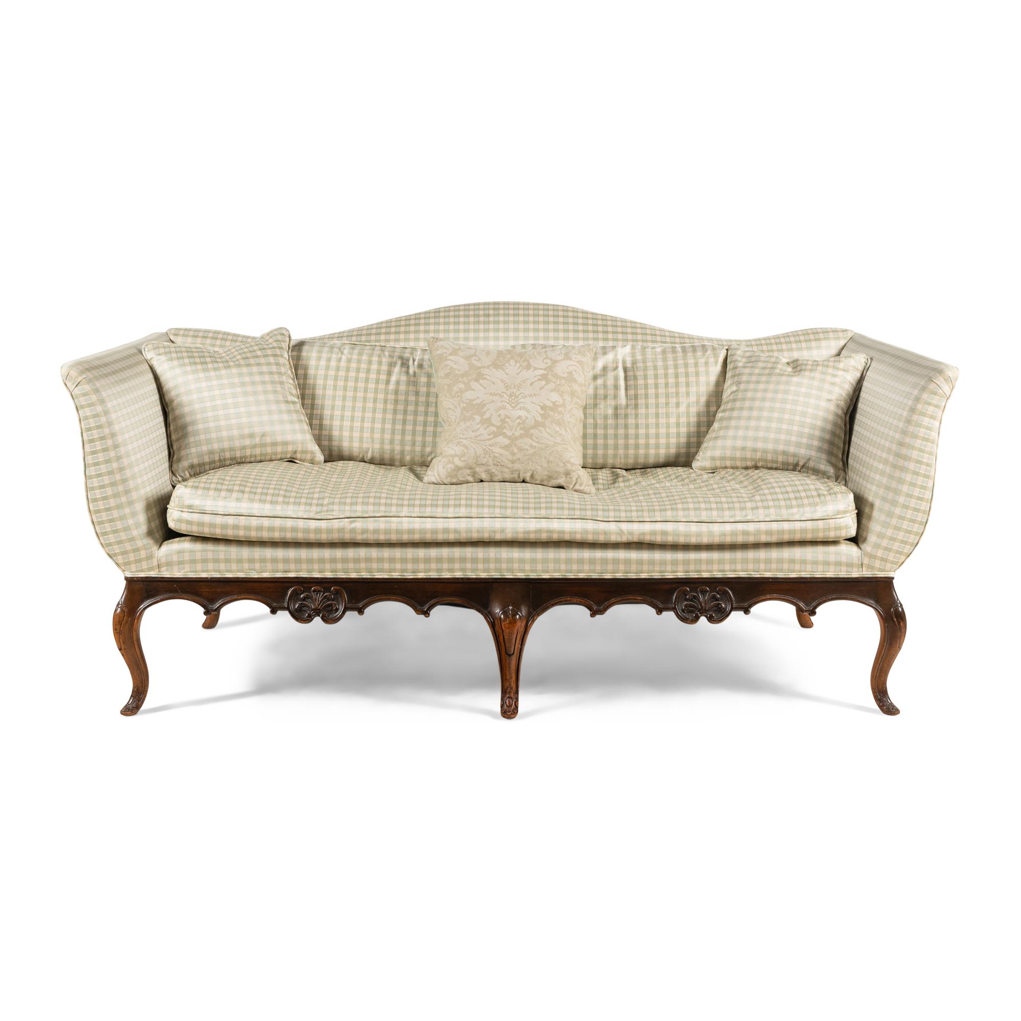 A Venetian Style Walnut Camelback Sofa