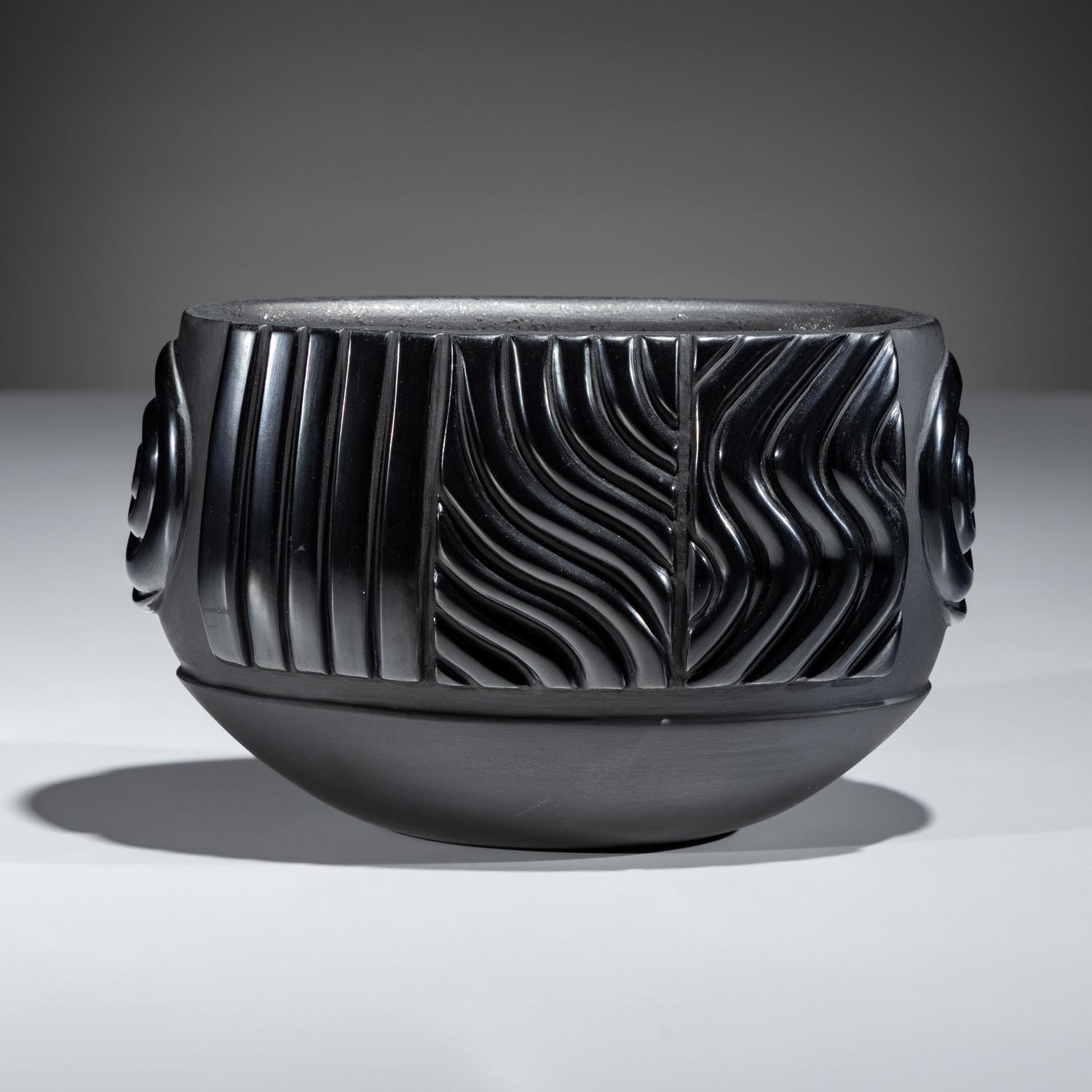 Carved Blackware Jar, with Micaceous Interior