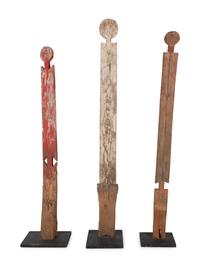 A Group of Three Carved Commemorative Posts