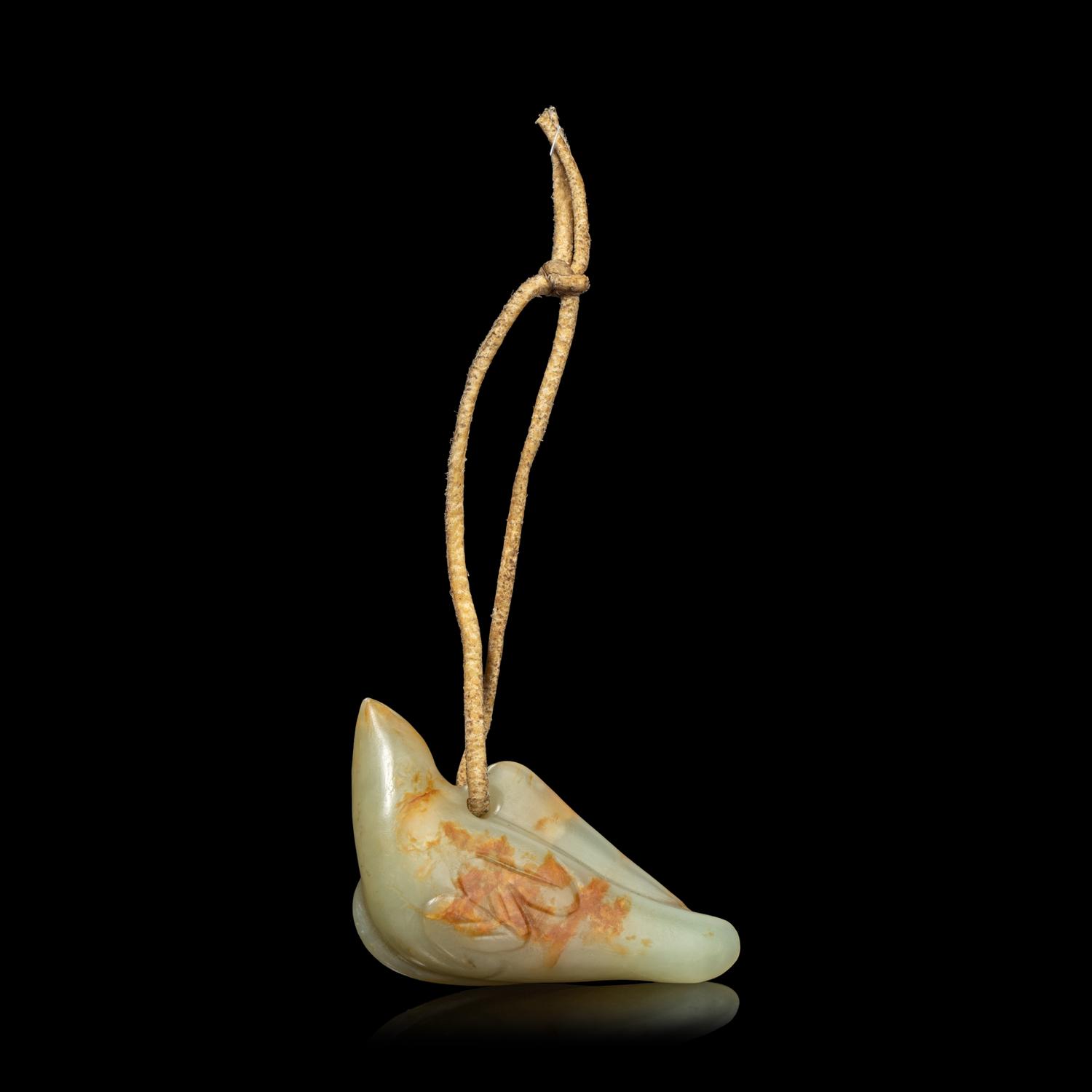 A Chinese Russet and Celadon Jade Carving of a Bird, Possibly Ming Dynasty 明 青白玉鳥