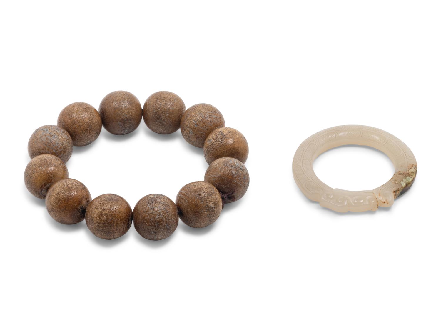 A Chinese Jade 'Dragon' Pendant and a Strand of Wood Praying Beads