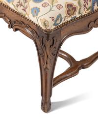A Pair of Louis XV Style Carved Benches