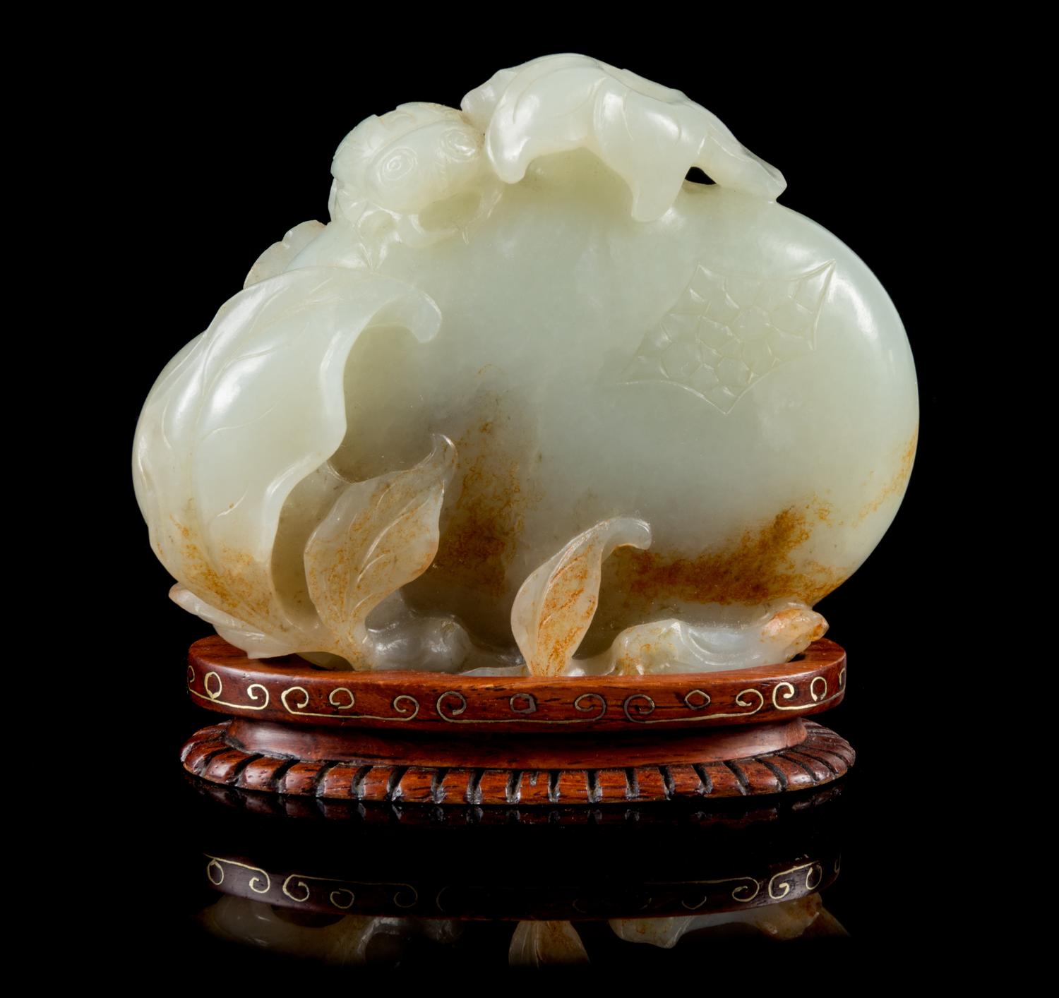 A Pale Celadon and Russet Jade Model of Pomegranates Height 3 inches. — 18TH/19TH CENTURY