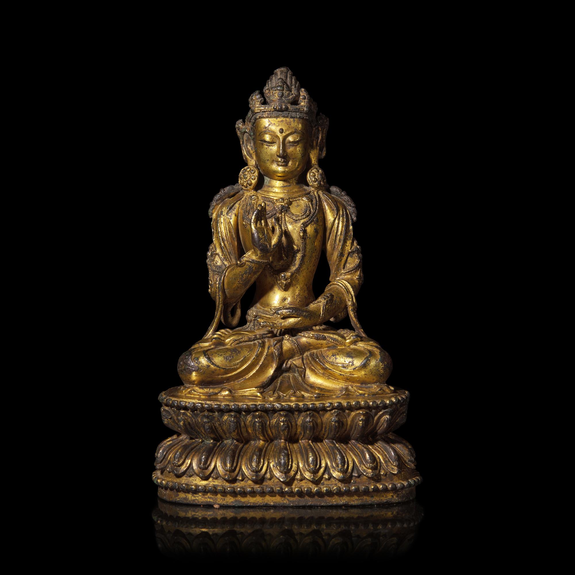 A Chinese Gilt Bronze Figure of a Seated Bodhisattva, Ming Dynasty, 15th Century 明 銅鎏金菩薩坐像