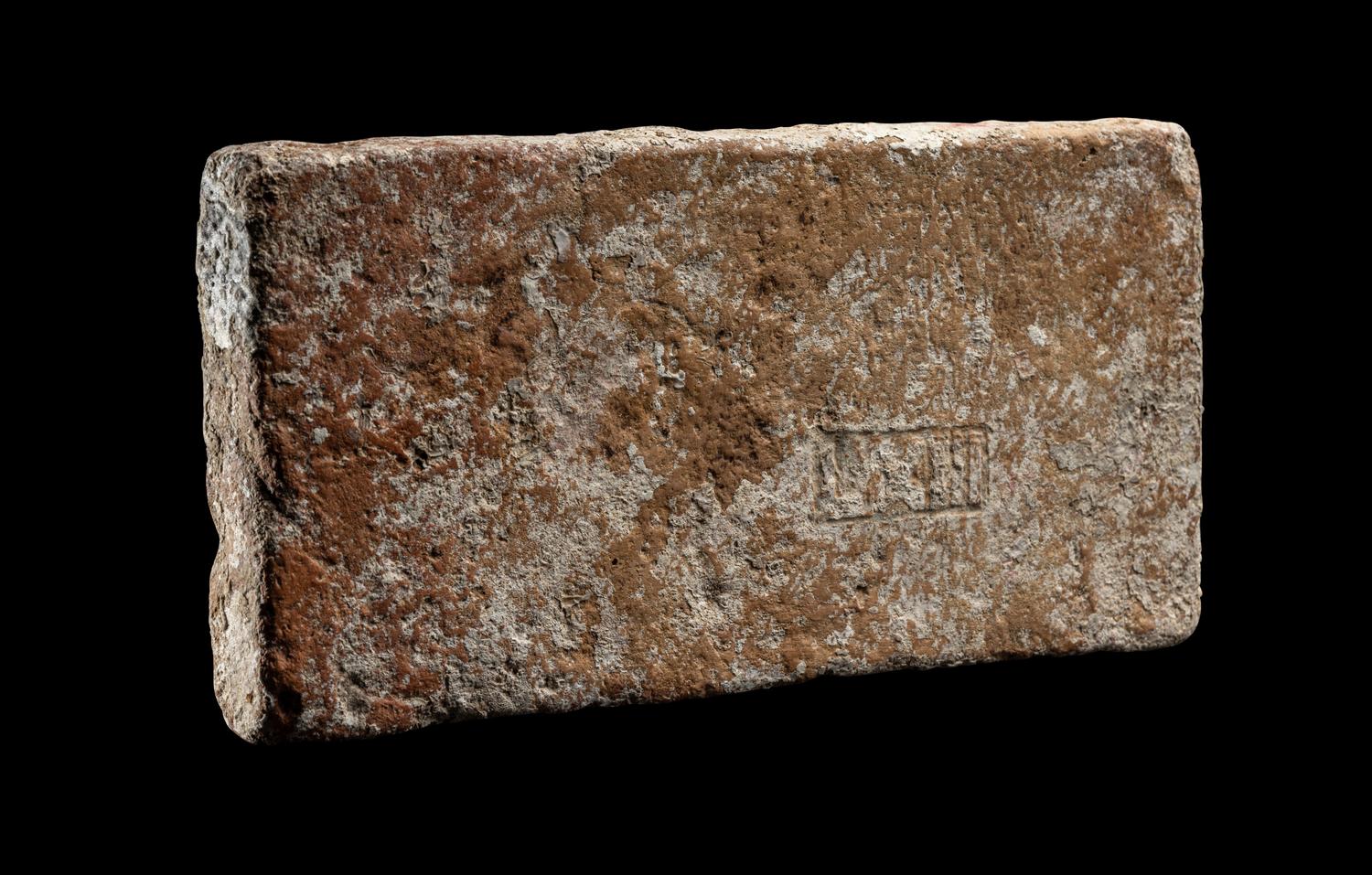 A Roman Ceramic Brick Stamped LXIII