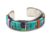 Sterling silver cuff bracelet with turquoise, coral, sugilite, and lapis mosaic inlay