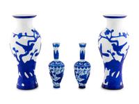 Two Pairs of Chinese Blue Overlay Opaque White Peking Glass Vases