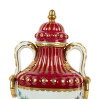A Pair of Limoges Porcelain Urns