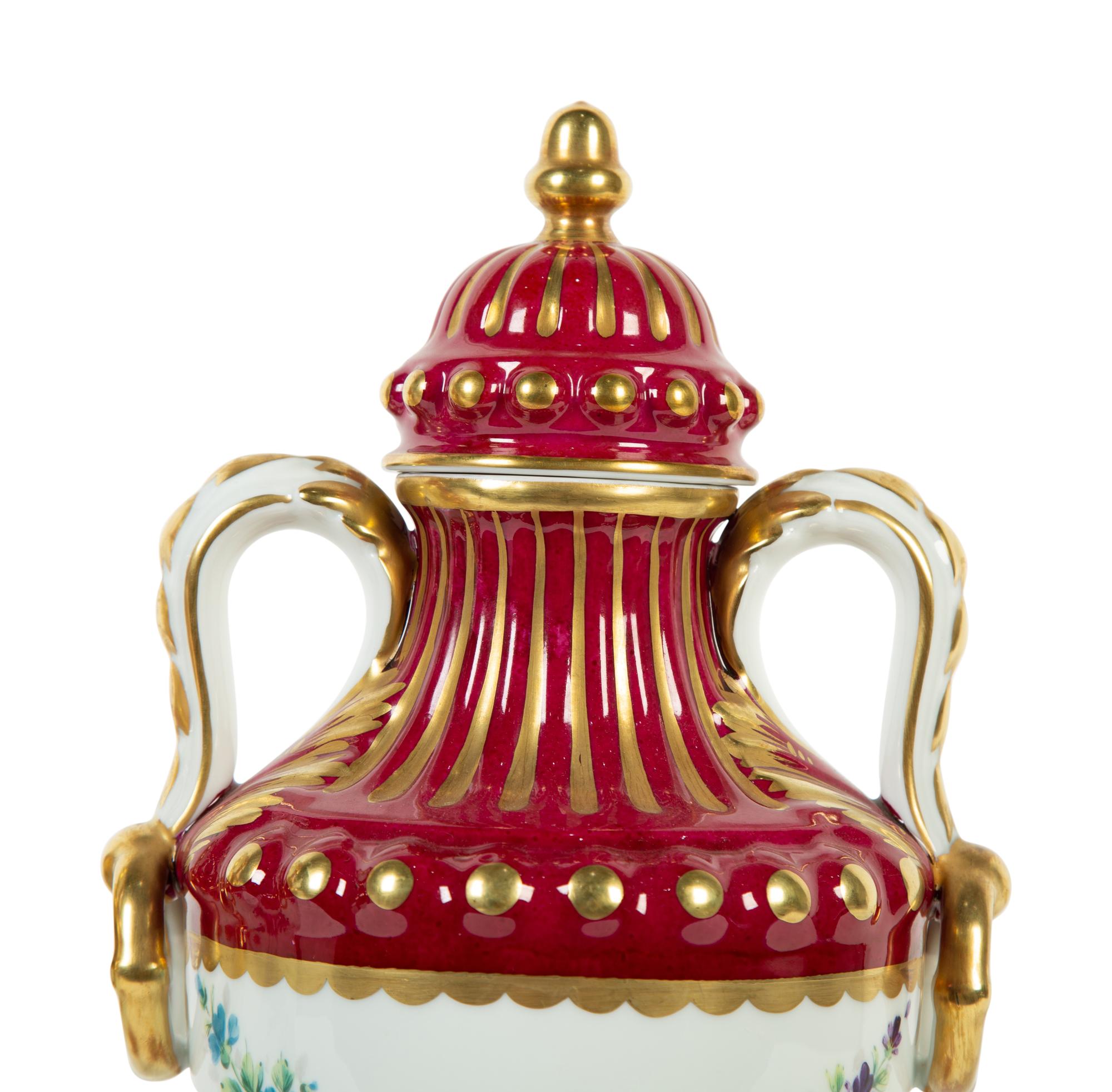 A Pair of Limoges Porcelain Urns