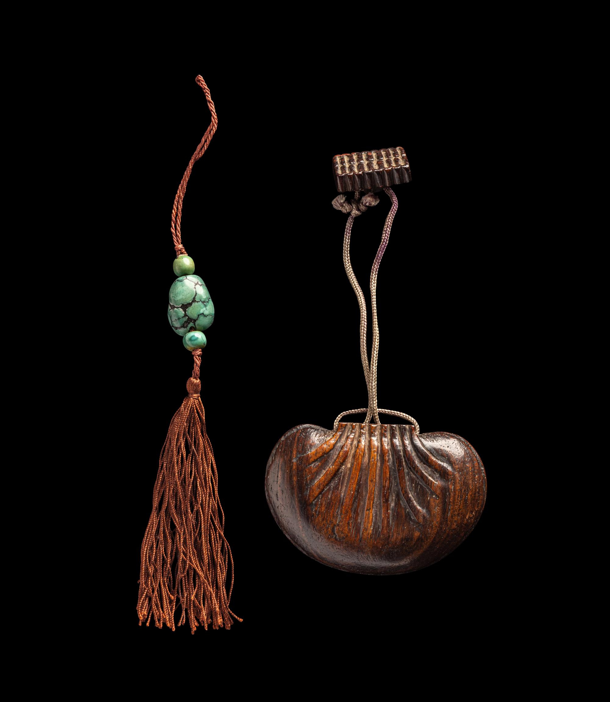 A Chinese Carved Hardwood Purse-Form Perfumier