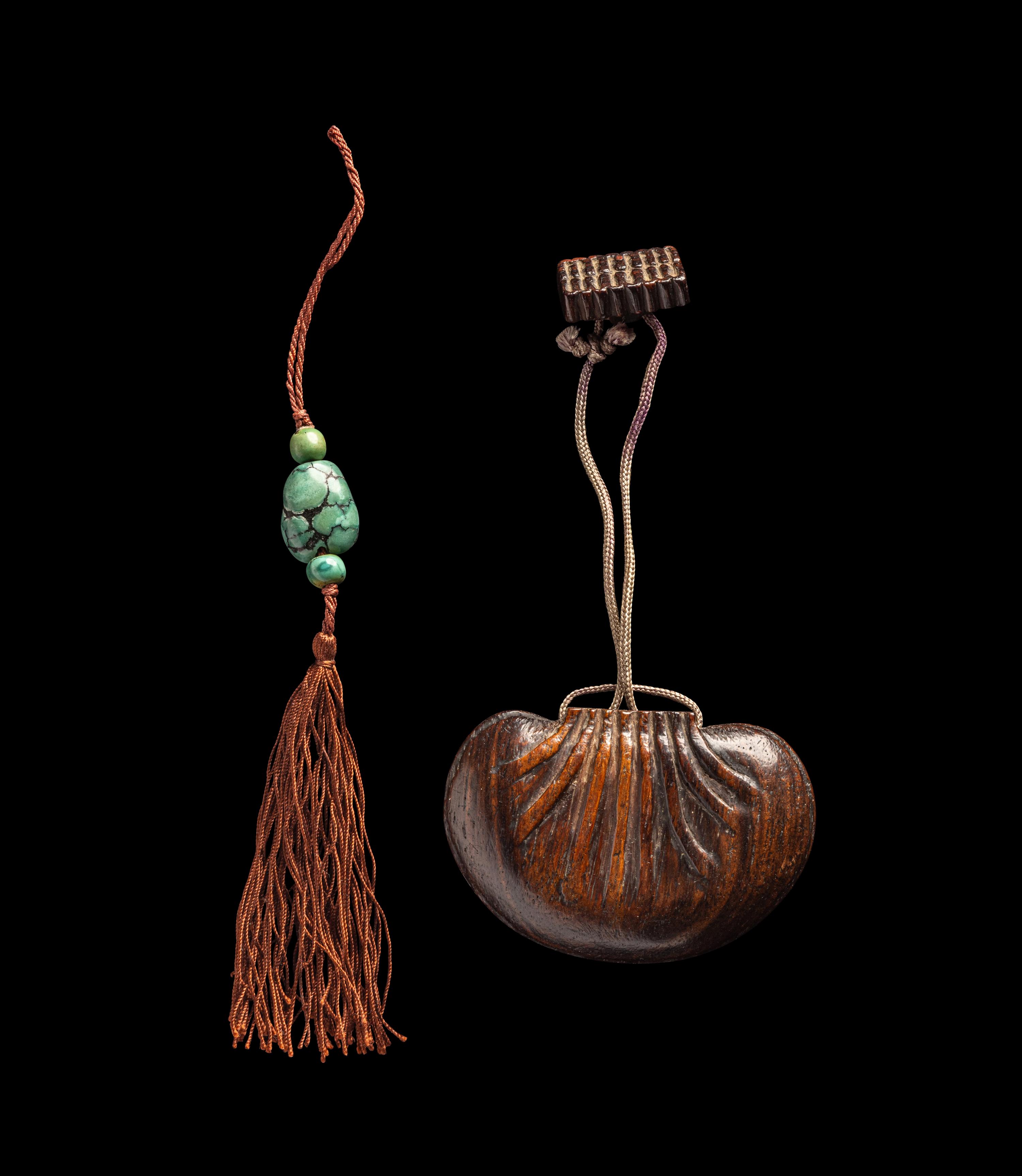 A Chinese Carved Hardwood Purse-Form Perfumier