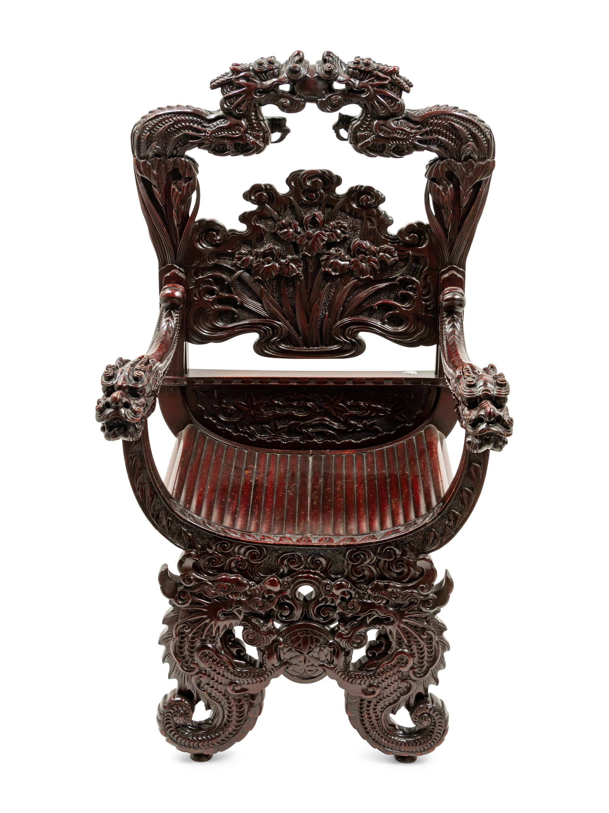 A Chinese Export Carved Hardwood Armchair