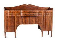 A Classical Highly Figured Cherrywood Scallop-Front Sideboard