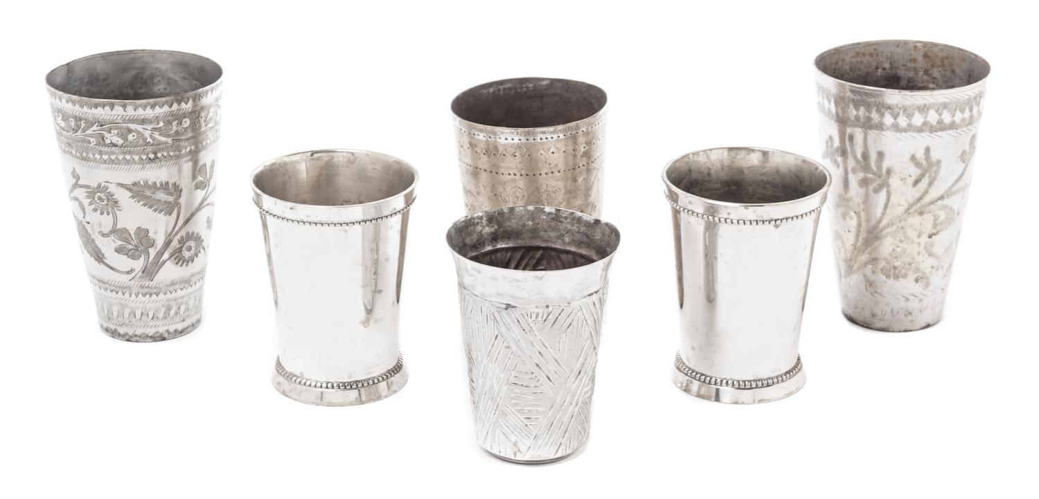A Group of Six Metal Cups Height of tallest 5 1/2 inches.