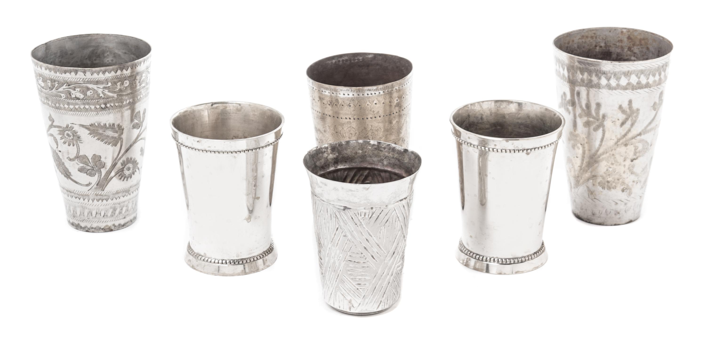 A Group of Six Metal Cups Height of tallest 5 1/2 inches.