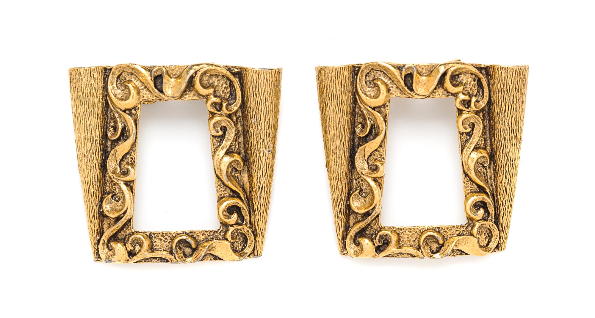 A Musi Goldtone Shoe Buckle,