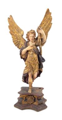 An Italian Painted and Gilt Figure of an Angel Height of figure 29 1/2 inches. — 17TH/18TH CENTURY