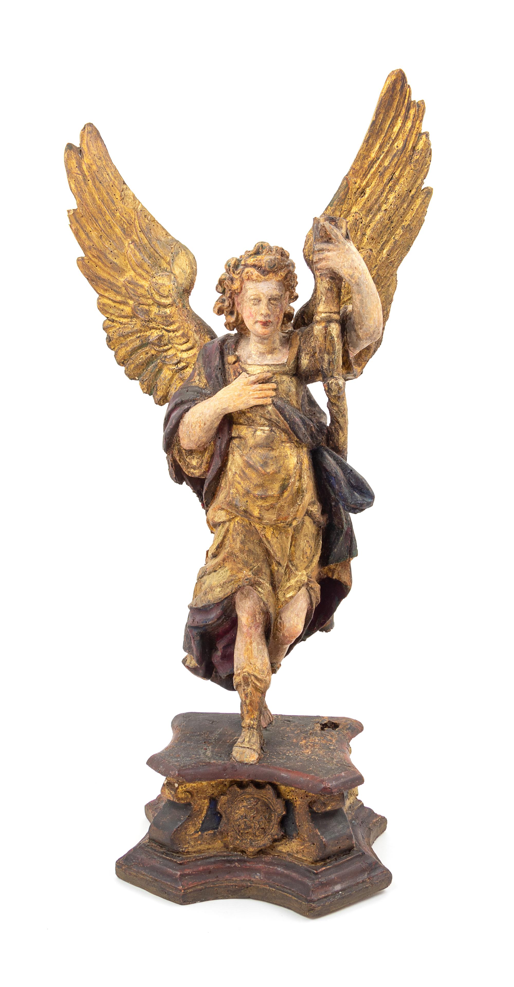 An Italian Painted and Gilt Figure of an Angel Height of figure 29 1/2 inches. — 17TH/18TH CENTURY