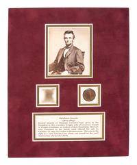 [LINCOLN, Abraham (1809-1865)]. Strands and lock of hair attributed to Abraham Lincoln.