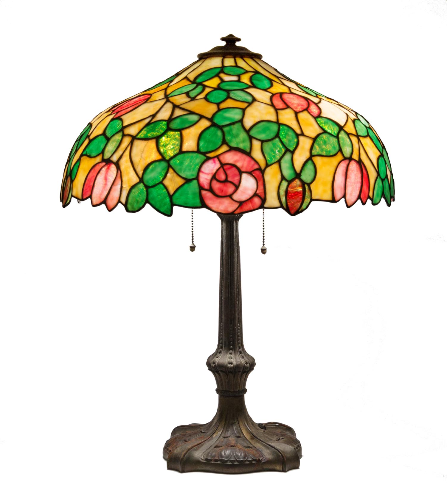 A Handel Leaded Glass Table Lamp Diameter of shade 18 1/2 inches, height overall 25 inches.