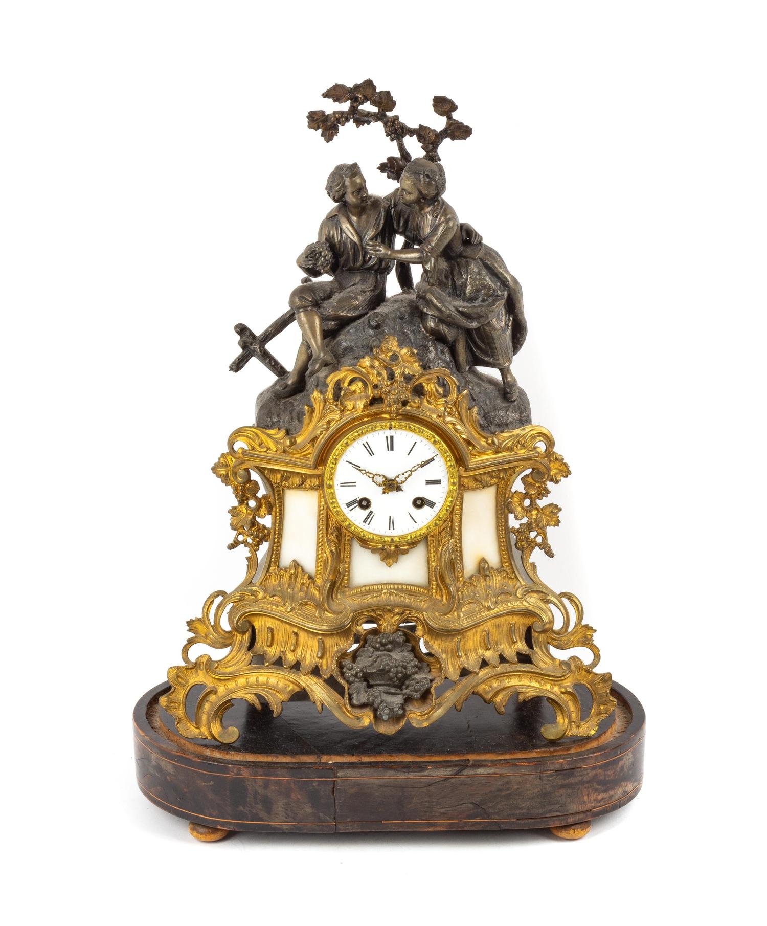 A French Cast Metal Figural Mantel Clock