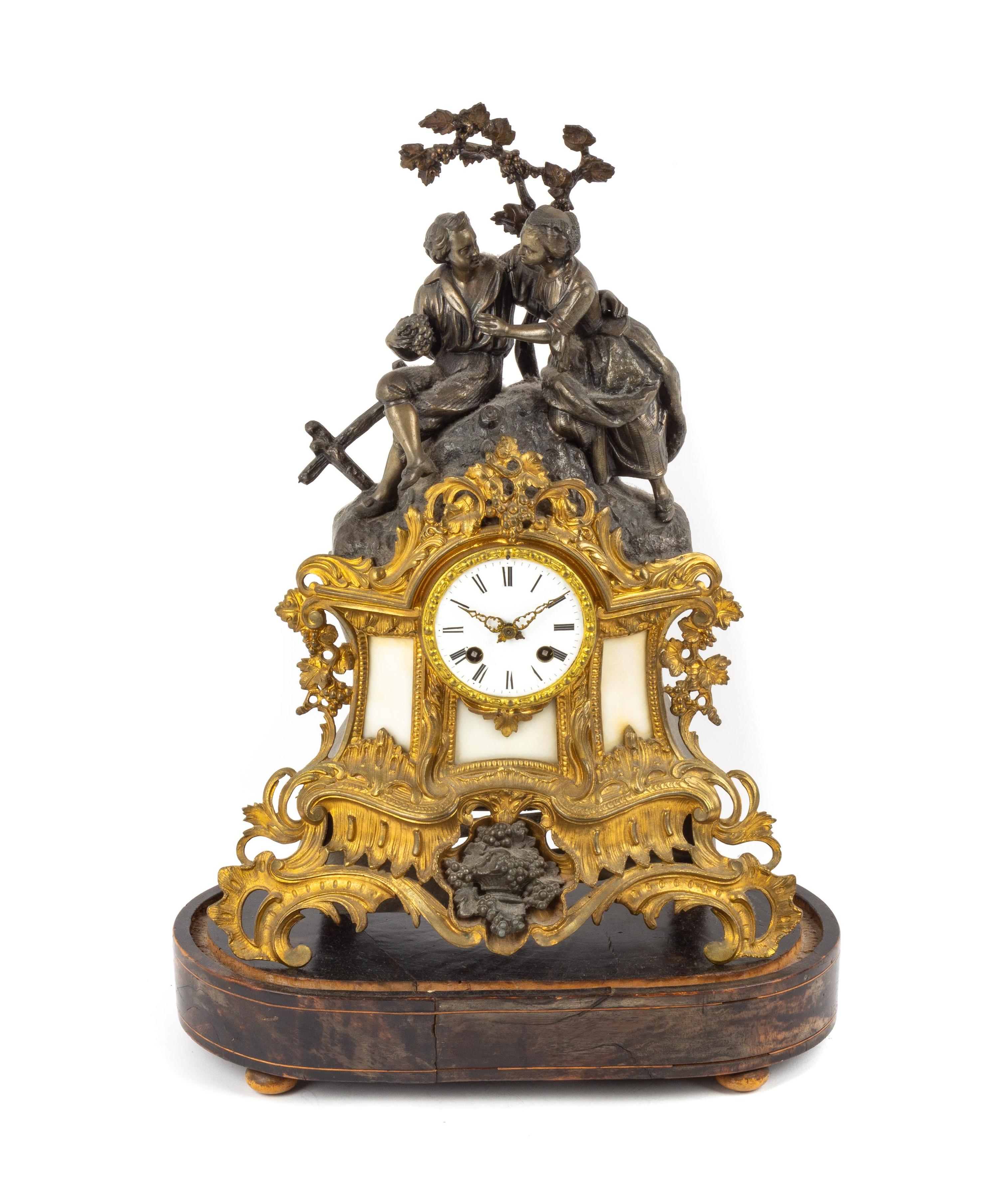 A French Cast Metal Figural Mantel Clock