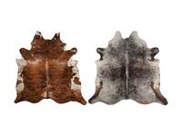 A Pair of Faux Cowhide Rugs