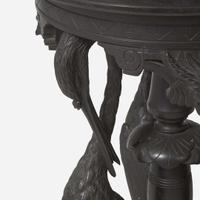 An Aesthetic Movement carved and ebonized wood pedestal with cranes late 19th century