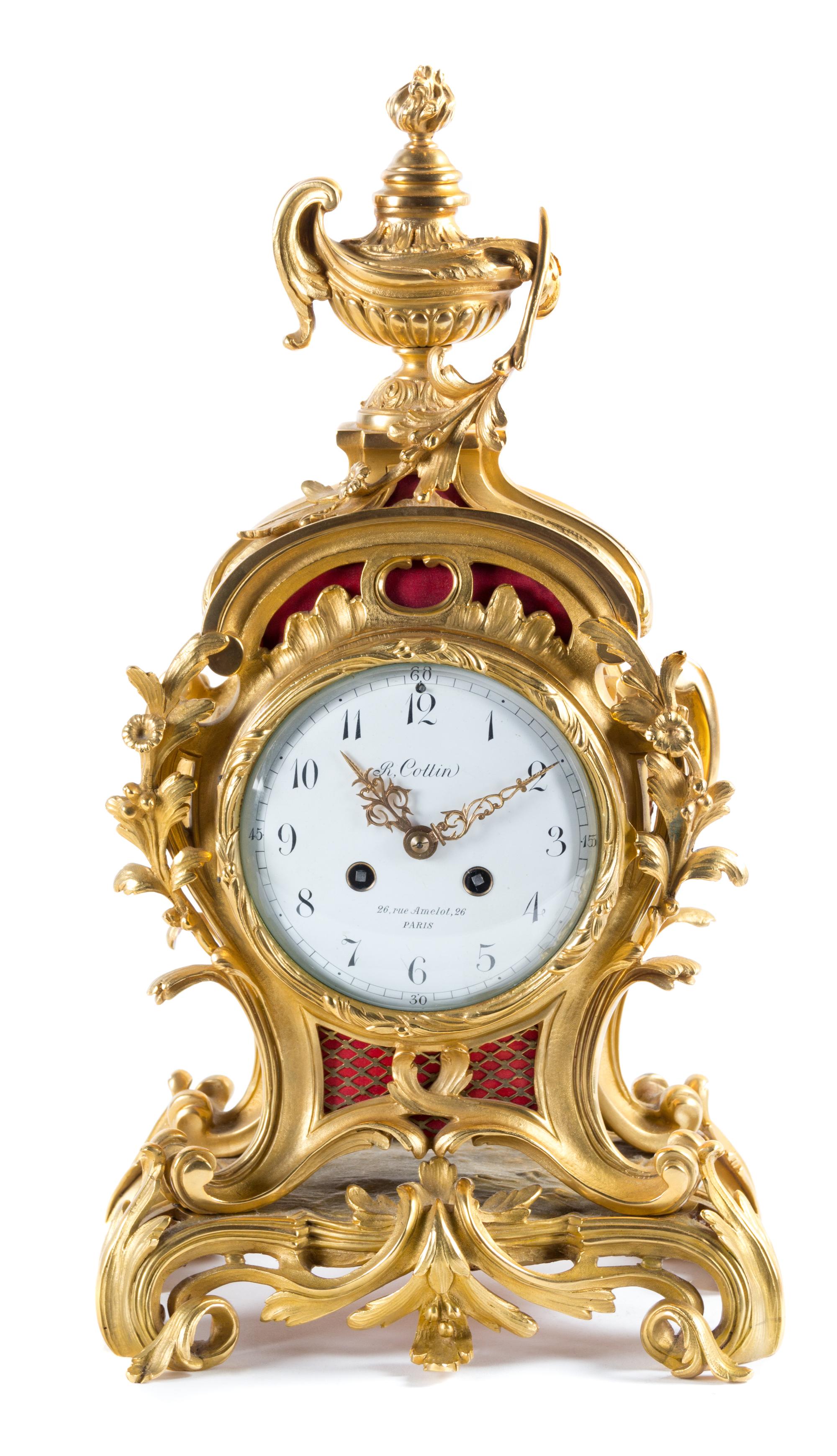 A Louis XV Style Gilt Bronze Mantel Clock Height 19 1/4 inches. — LATE 19TH/EARLY 20TH CENTURY