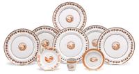 Group of Chinese Export porcelain plates and teawares decorated with sepia topographical views late 18th/19th century