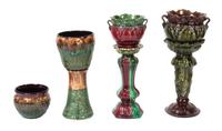 Three Majolica Jardinieres on Associated Stands Height of taller 24 inches.
