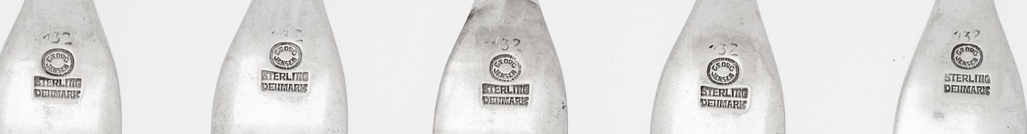 A Set of Six Georg Jensen Silver Flat Blossom Pattern Cocktail Forks