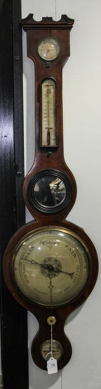 An English Mahogany Wheel Barometer Height 36 inches. — 19TH CENTURY