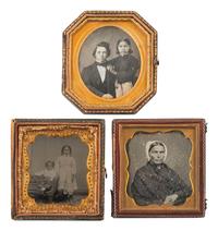 [EARLY PHOTOGRAPHY]. A group of 7 cased images featuring possibly mixed race subjects, including:
