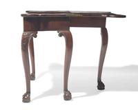 A George II carved mahogany card table, circa 1750