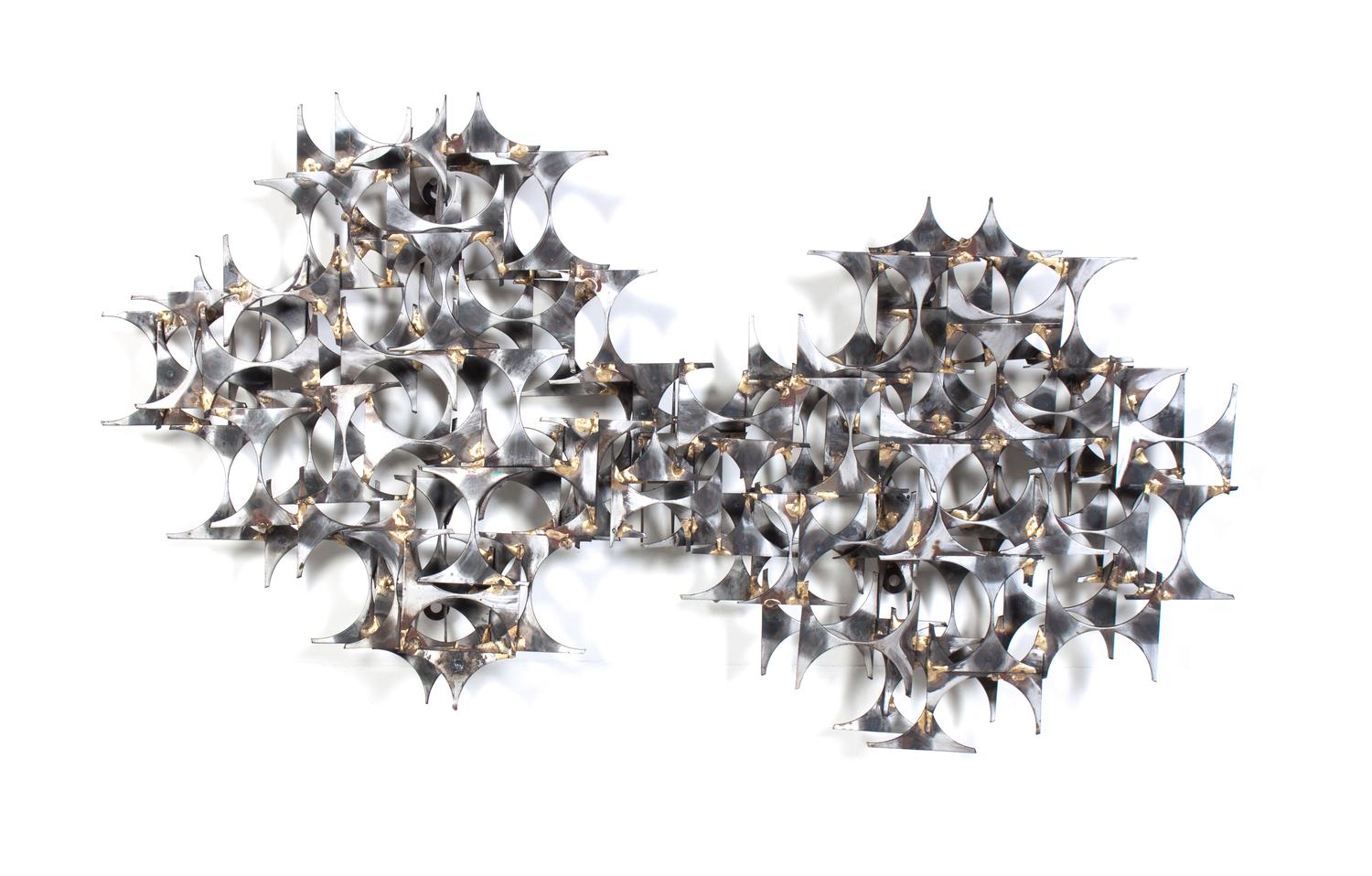 A Metal Wall Sculpture Length 36 inches. — STYLE OF CURTIS JERE