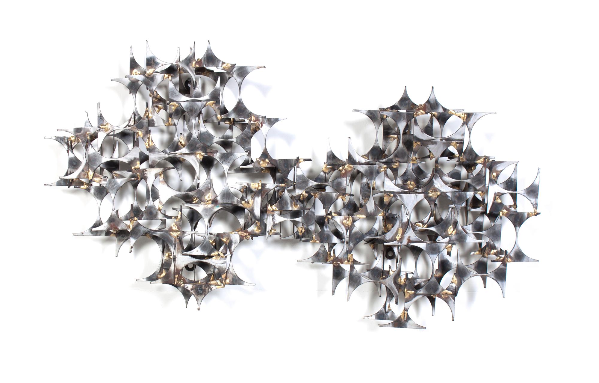 A Metal Wall Sculpture Length 36 inches. — STYLE OF CURTIS JERE