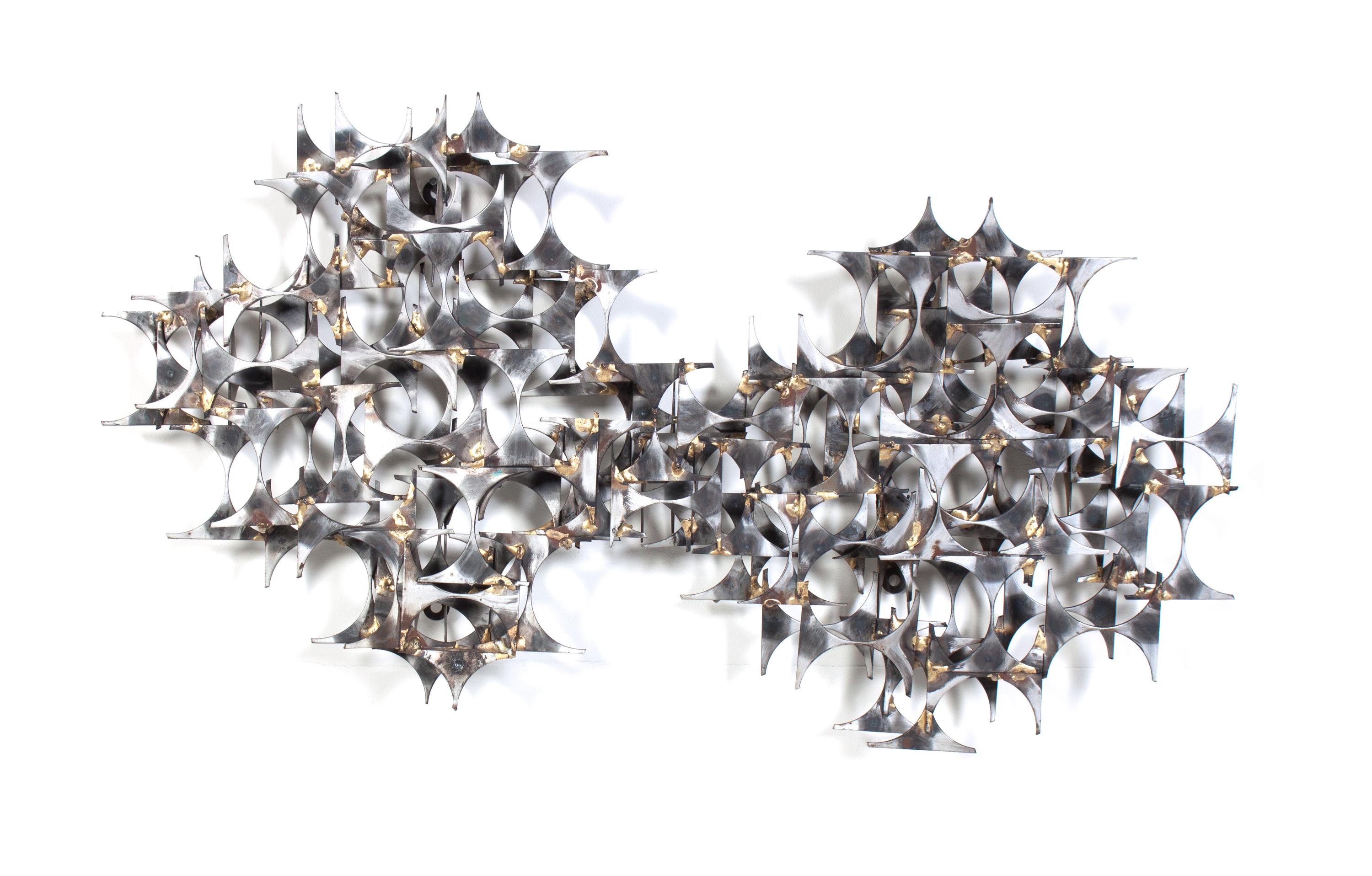 A Metal Wall Sculpture Length 36 inches. — STYLE OF CURTIS JERE