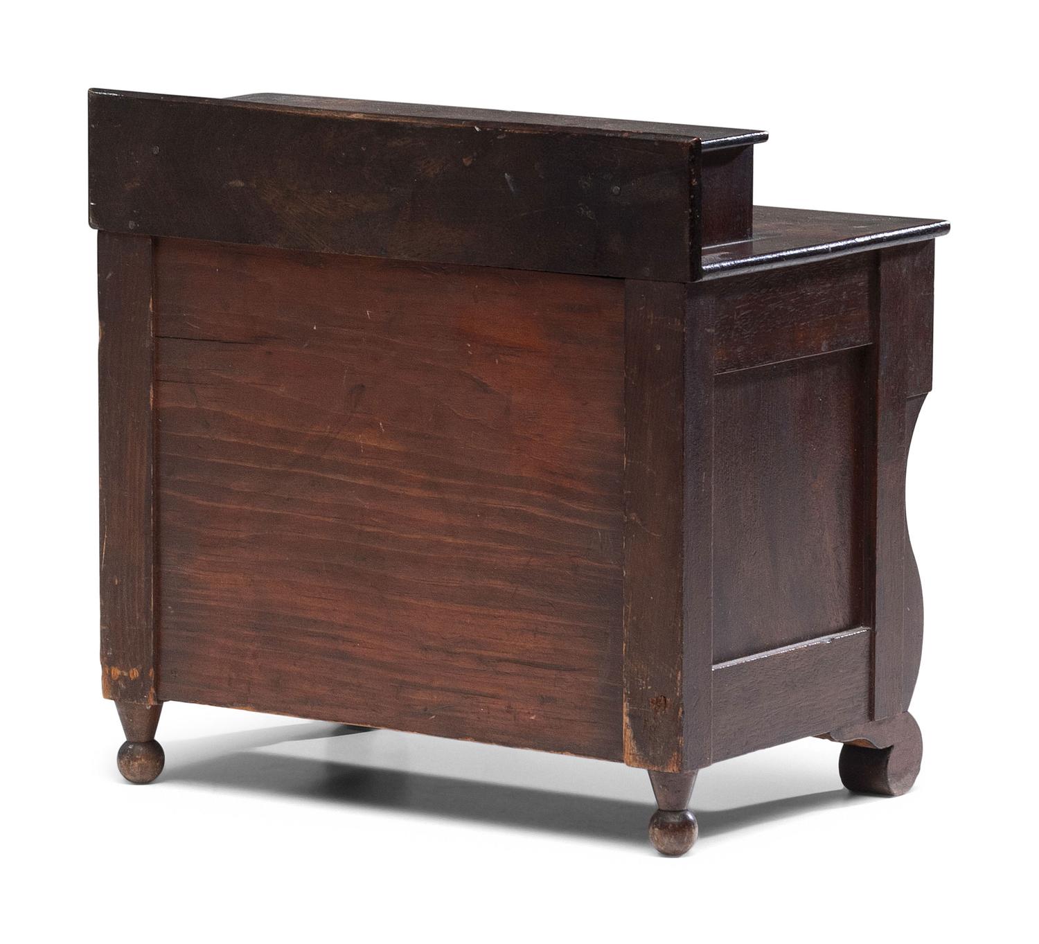 A Diminutive American Empire Mahogany Chest of Drawers