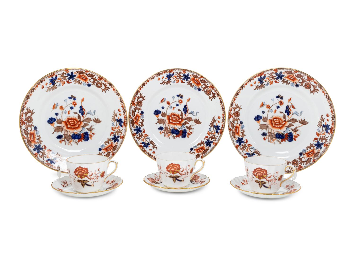 A Set of Twelve Spode Dinner Plates and a Similar Set of Royal Crown Derby Cups and Saucers
