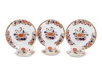 A Set of Twelve Spode Dinner Plates and a Similar Set of Royal Crown Derby Cups and Saucers